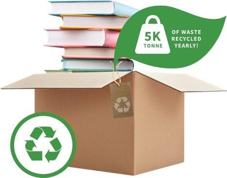 Stack of books on a cardboard box with recycling logo and badge stating 5K tonne of waste recycled yearly