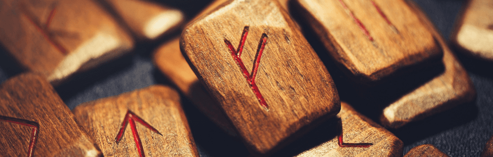 Elder Futhark runes on wooden tablets.png