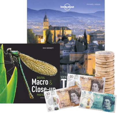 Photography books on Granada and macro photography, with UK banknotes and coins for cash