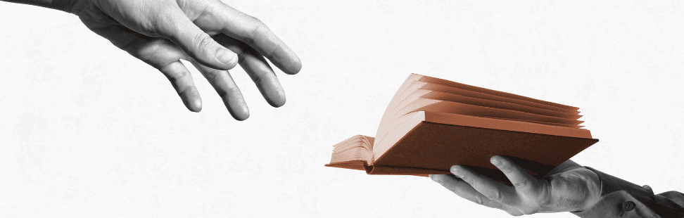 Header image of two hands reaching for a textbook.png