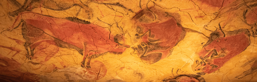 Pre-neolithic cave paintings of buffalo.png