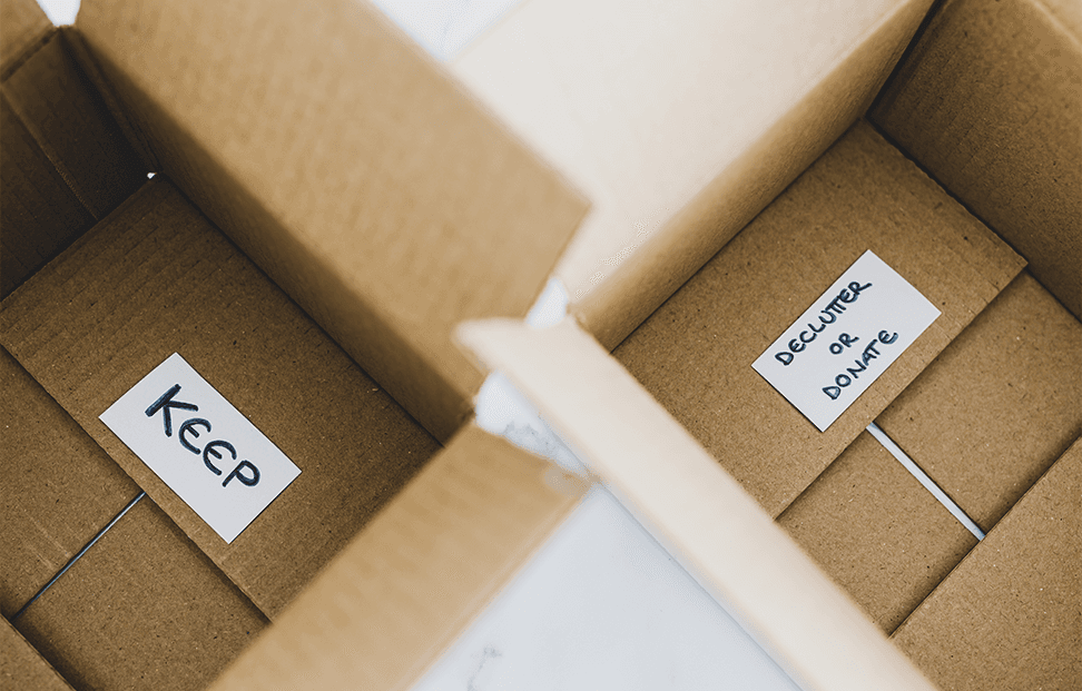 two empty boxes labelled 'keep' and 'declutter or donate'.png