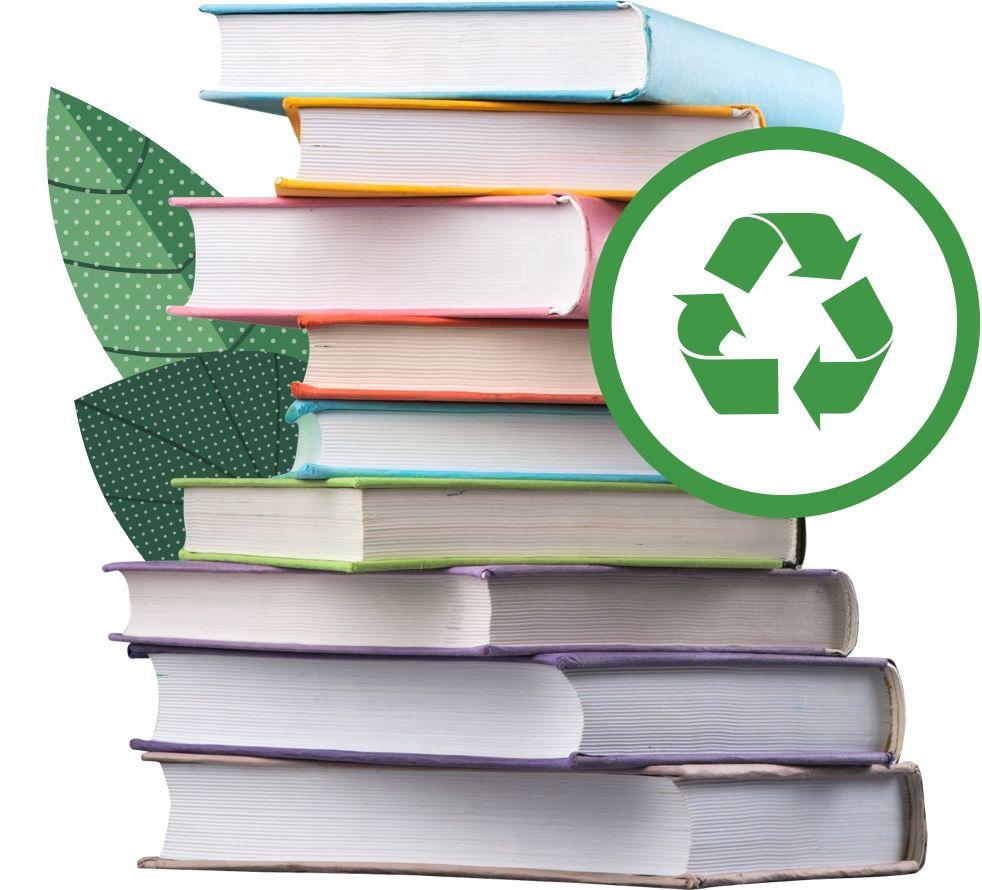 Stack of colourful used books beside a green recycling symbol, symbolising reusing books for cash